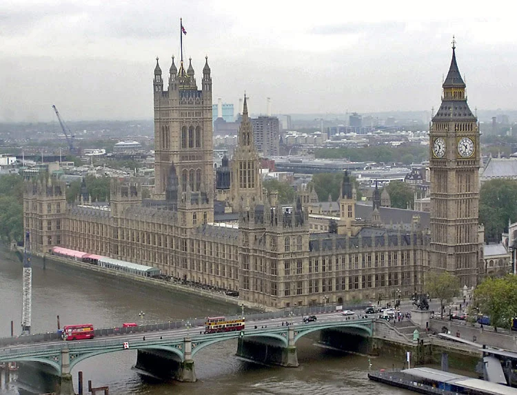 The Palace of Westminster beside the River Thames in London